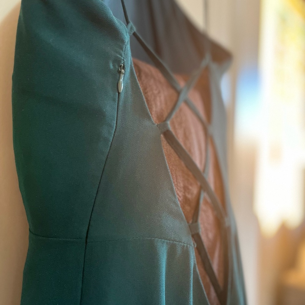 Event dress by Tobi. Floor length, forest green with high slit & lace up back.
